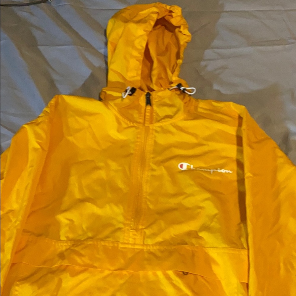 A Yellow champions windbreaker